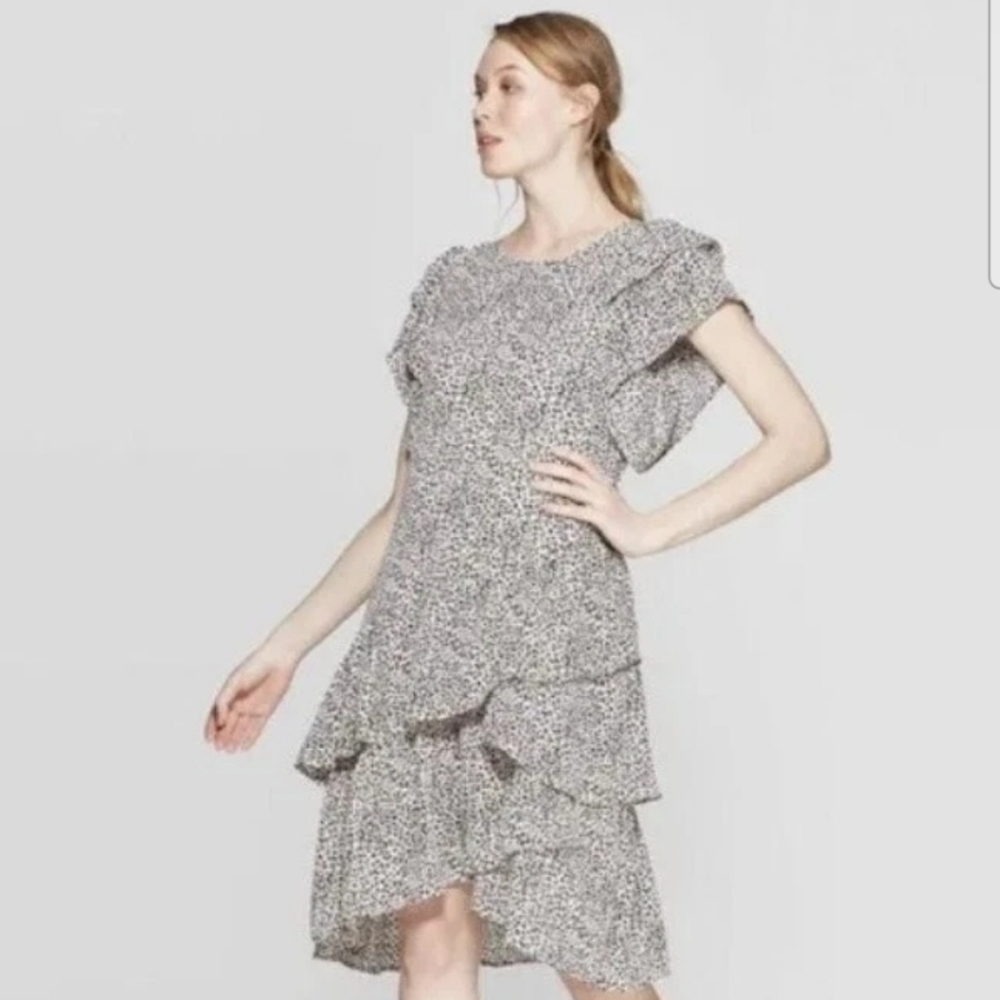 WHO WHAT WEAR Elegant Black and White Leopard Print Dress